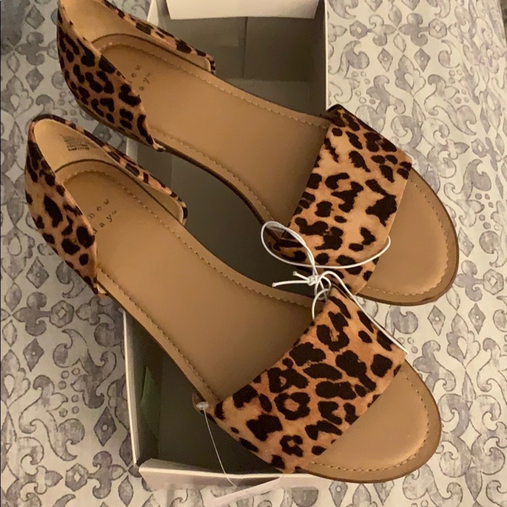 Leopard “Two Piece” slide sandal.